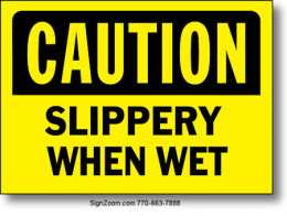 CAUTION SLIPPERY WHEN WET Sign