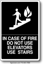 BRAILLE IN CASE OF FIRE DO NOT USE ELEVATORS USE STAIRS Sign